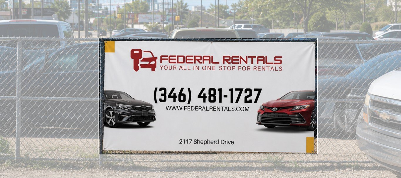 Federal Rentals banner with phone number and address hung on a fence at the lot